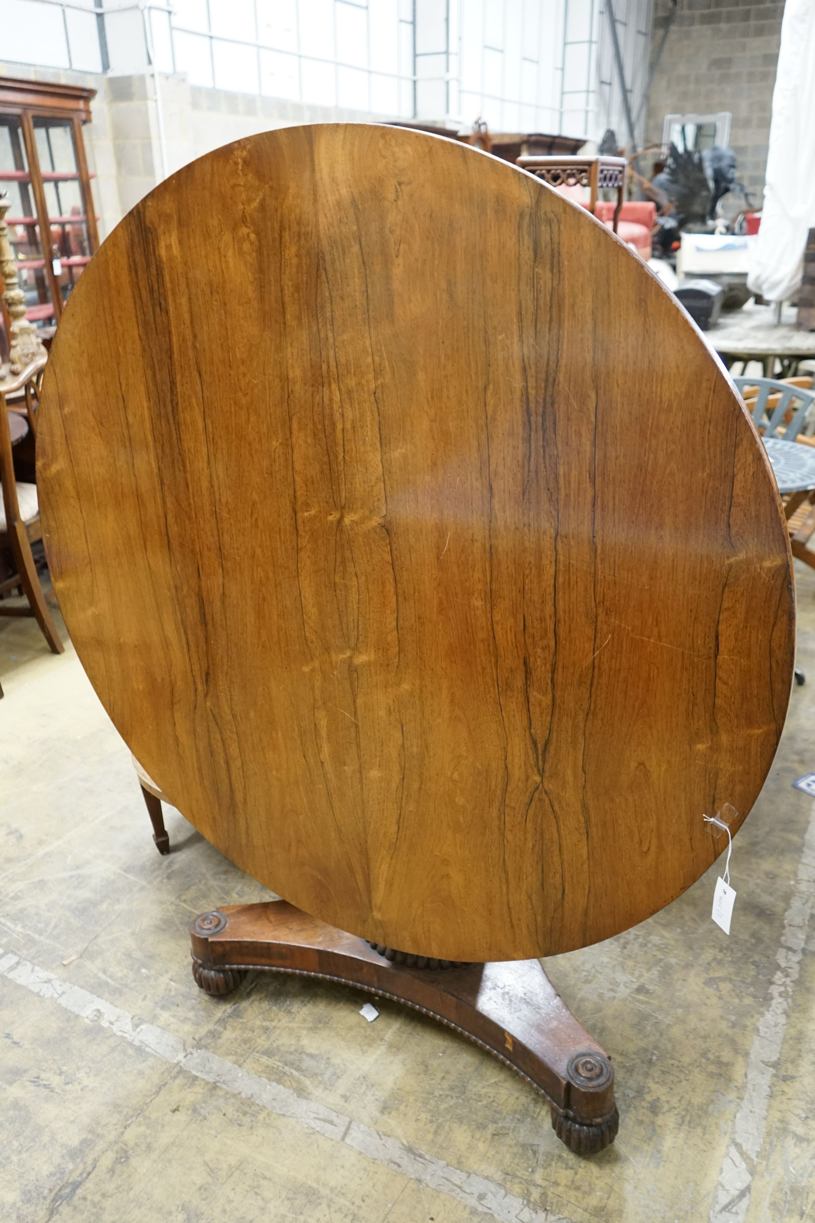 A Regency circular rosewood tilt top breakfast table, diameter 120cm, height 76cm